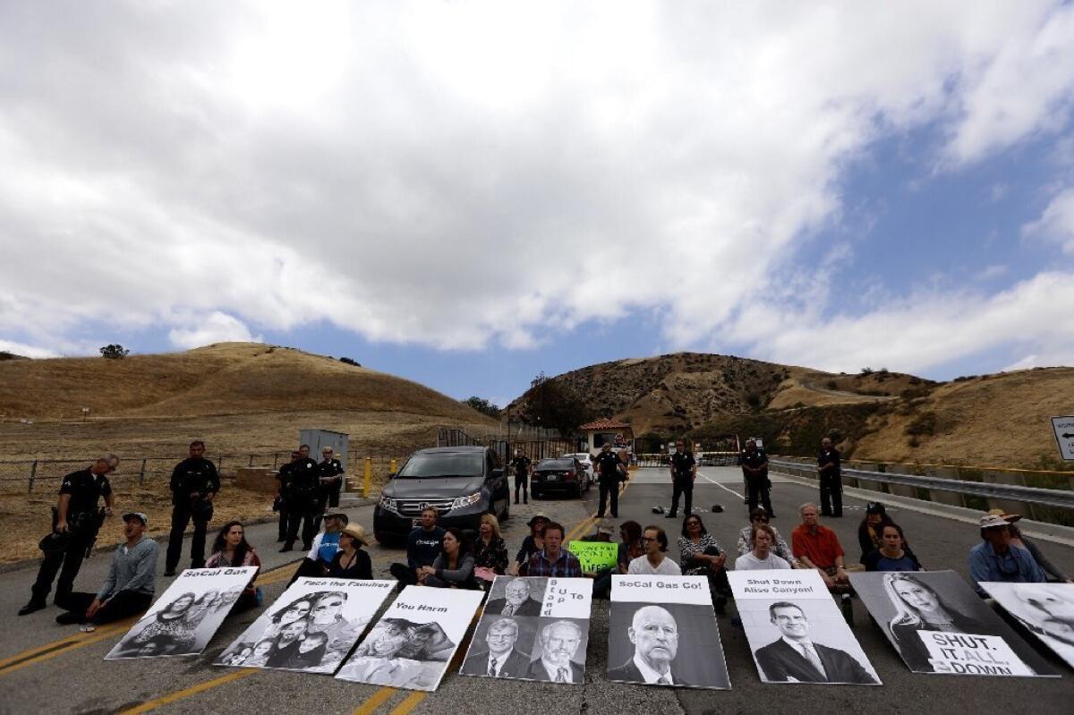 Protesters staged a sit-in Saturday at the entrance to Aliso Canyon natural gas storage facility in the hills above Porter Ranch.