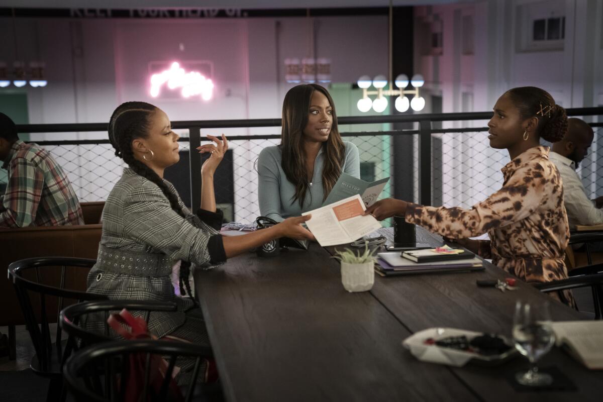 Christina Elmore, left, Yvonne Orj and Issa Rae in "Insecure.” 
