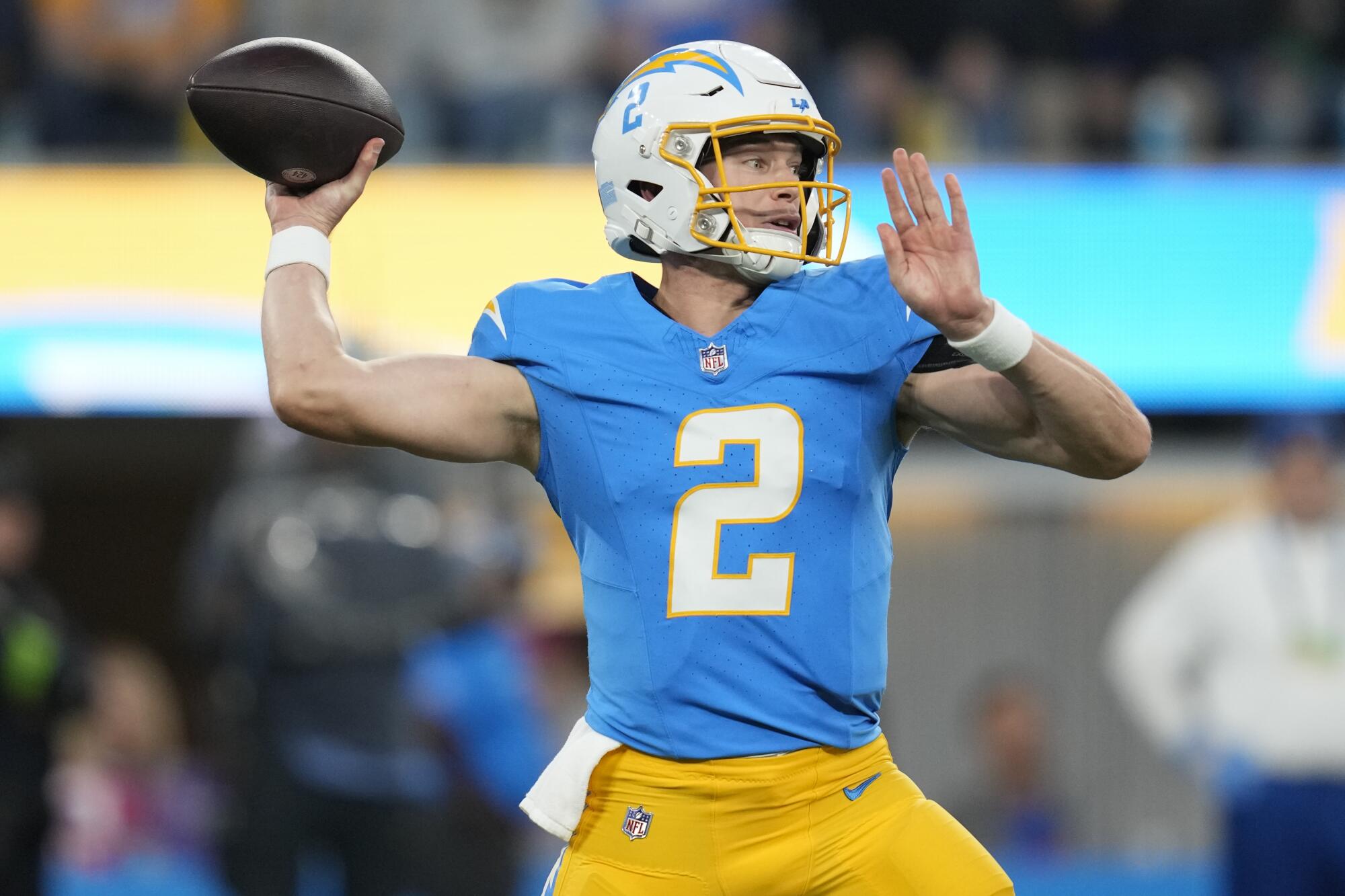 Chargers quarterback Easton Stick passes against the Buffalo Bills in the first quarter Saturday at SoFi Stadium.