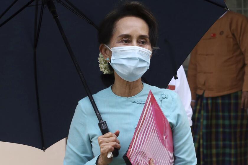 Myanmar Leader Aung San Suu Kyi leaves after the Central Executive Committee meeting in Naypyitaw, Myanmar.