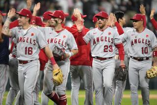 The Los Angeles Angels celebrate the team's 6-4 win over the Chicago White Sox in a baseball game.