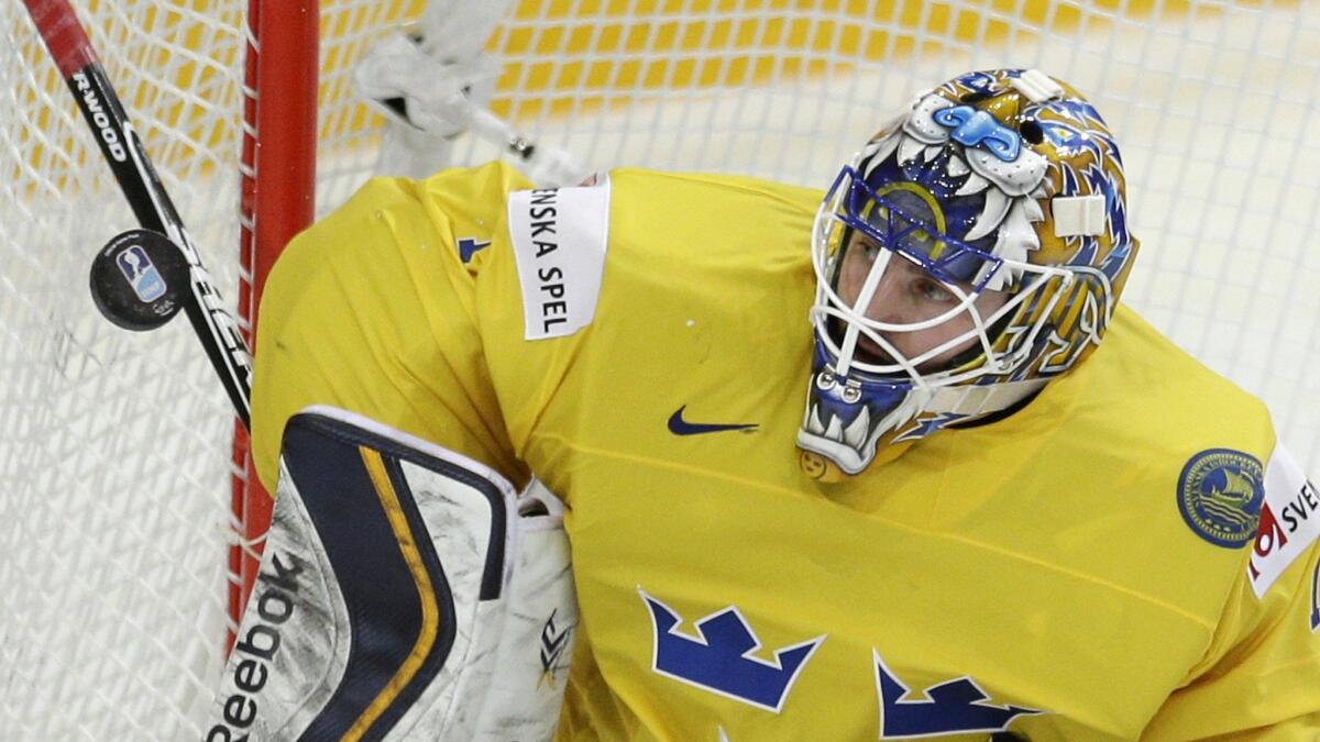 Sweden’s Jhonas Enroth makes a save during an IIHF World Championship group game against the Czech Republic on May 9. The L.A. Kings have signed Enroth to a one-year deal worth $1.25 million.