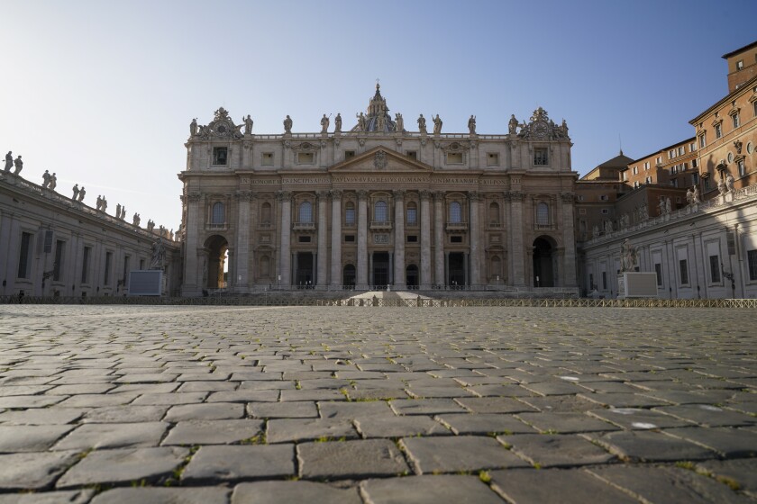 FILE - A view of St. Peter's Basilica at the Vatican, on Nov. 10, 2020. On Tuesday, Nov. 10, 2020. The Vatican said Friday it had completed the sale of a London residential building that is at the heart of a fraud and embezzlement trial under way in the Vatican City State’s tribunal, recovering more than it expected from the loss-making investment. The Vatican’s economy ministry revealed the sale contract had been signed, and 10% of the deposit received, as it released the Holy See’s budget for 2022. It foresees a narrowing of the Holy See’s budget deficit to €33 million euros from €42 million euros last year. (AP Photo/Andrew Medichini, File)