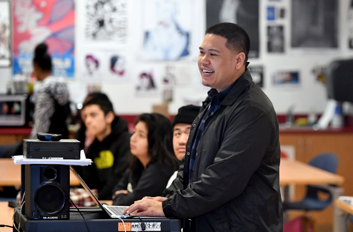 Jr Arimboanga, an ethnic studies teacher, shows a video about racism at John O'Connell High School in San Francisco in 2018.