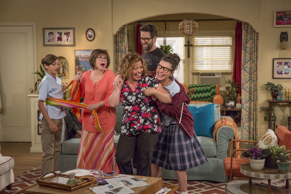 Marcel Ruiz, left, Rita Moreno, Justina Machado, Todd Grinnell and Isabella Gomez in Season 2 scene from "One Day at a Time."