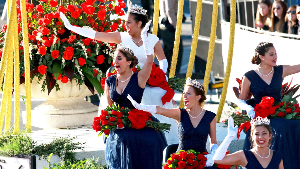 2015 Rose Queen Madison Triplett and her court wave to the crowd.