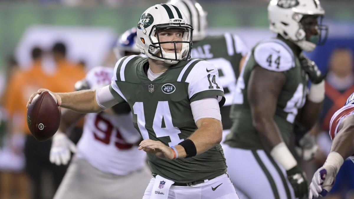New York Jets quarterback Sam Darnold steps back to throw against the New York Giants on Aug. 24.