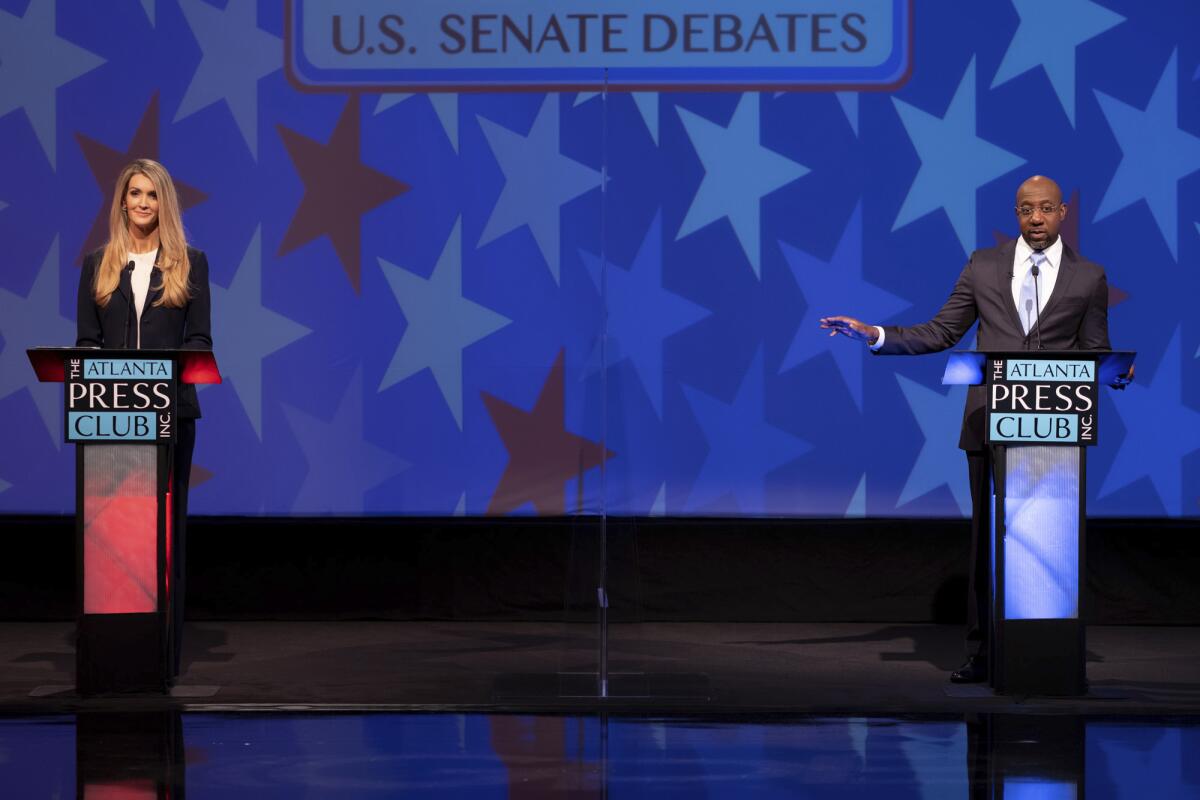 Kelly Loeffler debates her Democratic challenger for U.S. Senate Raphael Warnock.