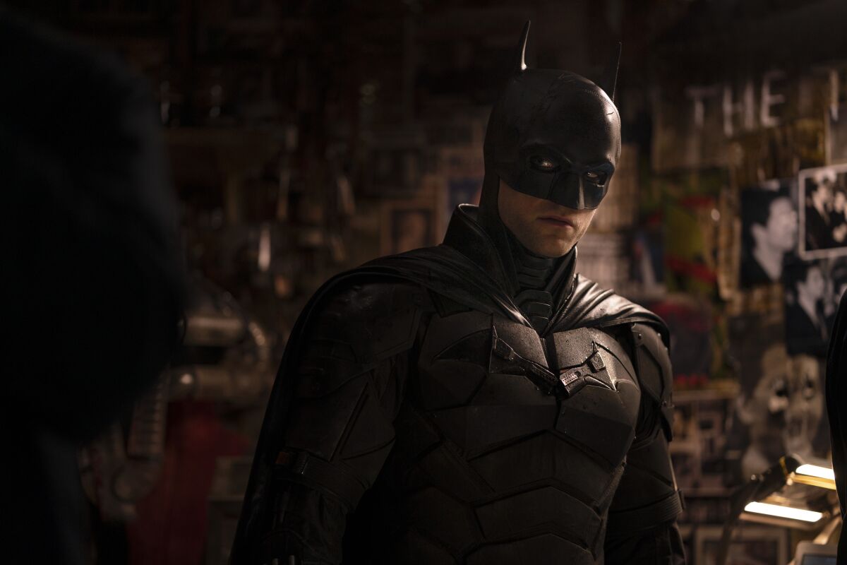 A man in a Batman costume