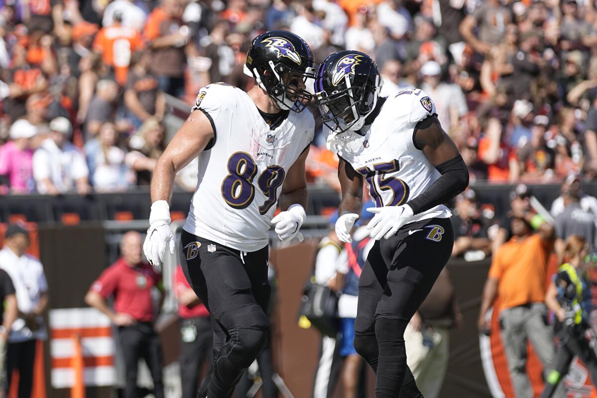 Baltimore Ravens tight end Mark Andrews celebrates with wide receiver Nelson Agholor after scoring a 7-yard touchdown.