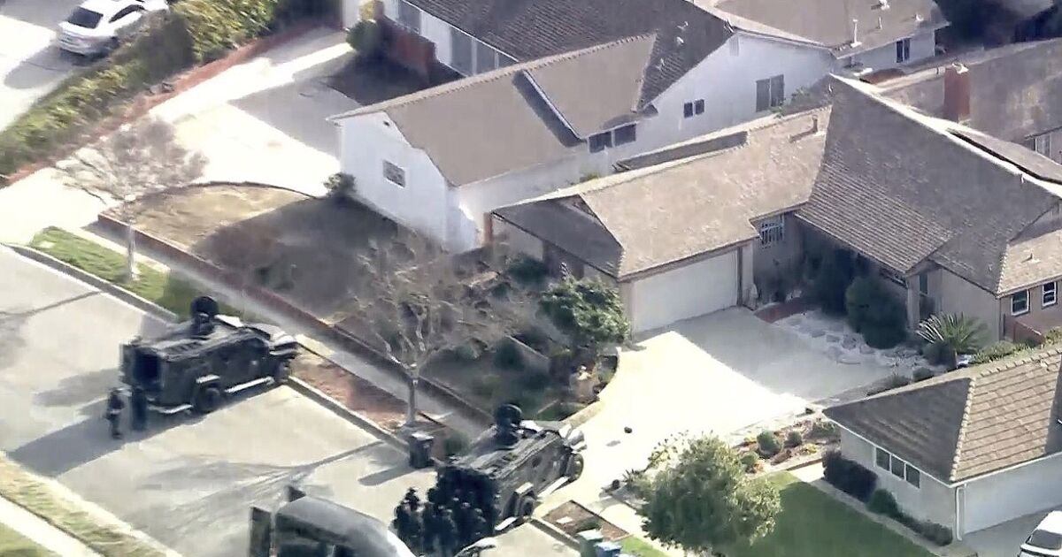 Suspect in fatal stabbing of 17-year-old student is in standoff with police at his Alhambra home