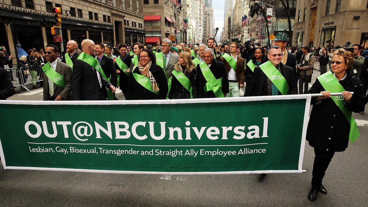 Members of the first openly gay group to participate in New York City's St. Patrick's Day Parade, OUT@NBCUniversal, make their way up 5th Avenue.