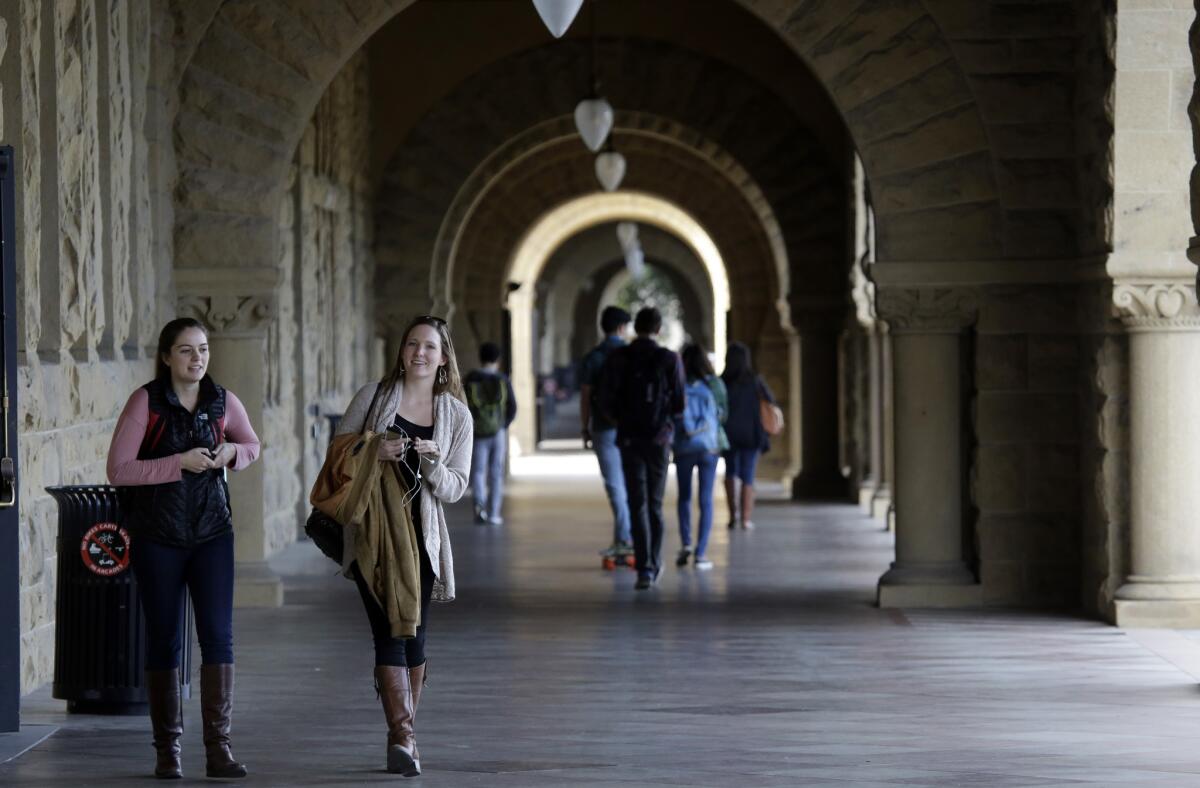 Students walk on campus at Stanford University on Jan. 13. In 2014, Stanford's design school developed a proposal for what it called an “open loop university,” which would admit students for six years of study that could be undertaken at any time.