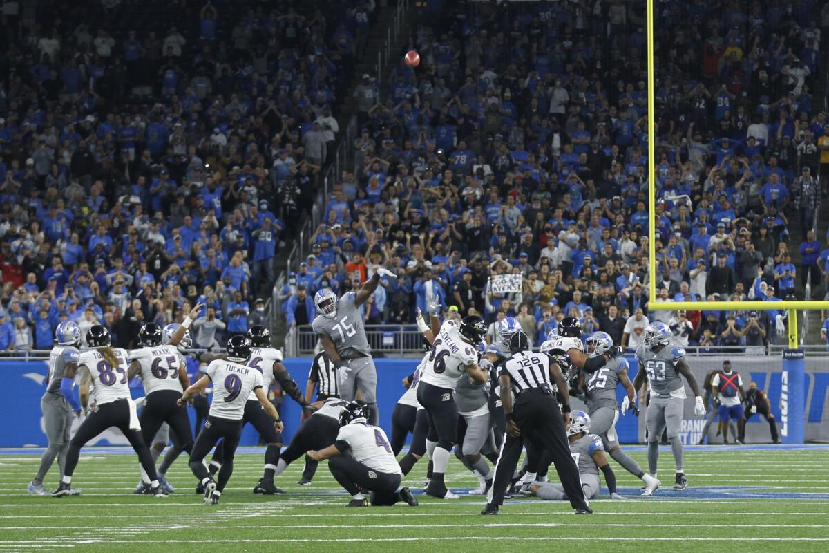 Tucker's 66-yarder sets record, gives Ravens win at Detroit - The