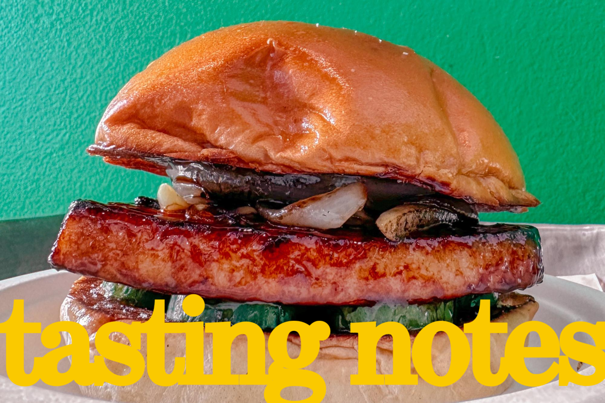 Pork belly char siu bun with grilled onion, pickled cucumber and honey glaze at Needle in Silver Lake.