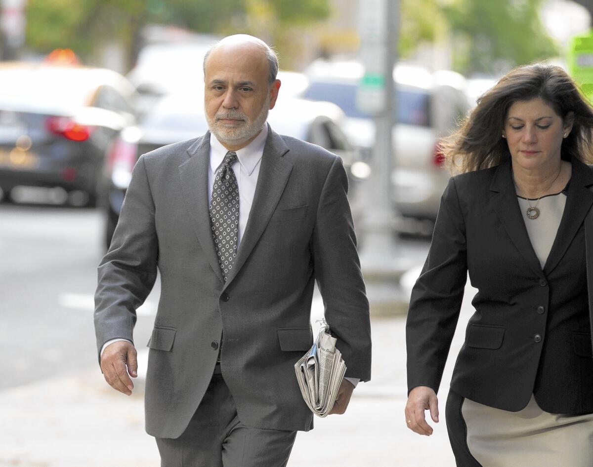 Former Federal Reserve Chairman Ben S. Bernanke arrives at the U.S. Court of Federal Claims in Washington, D.C., to testify in a suit on the U.S. government's 2008 bailout of AIG.