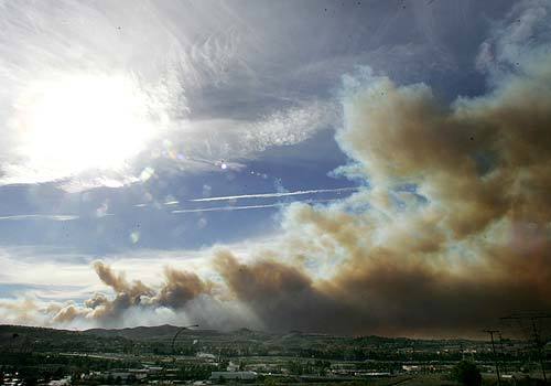 Smoke fills the sky from a fire in Anaheim off the Imperial highway.