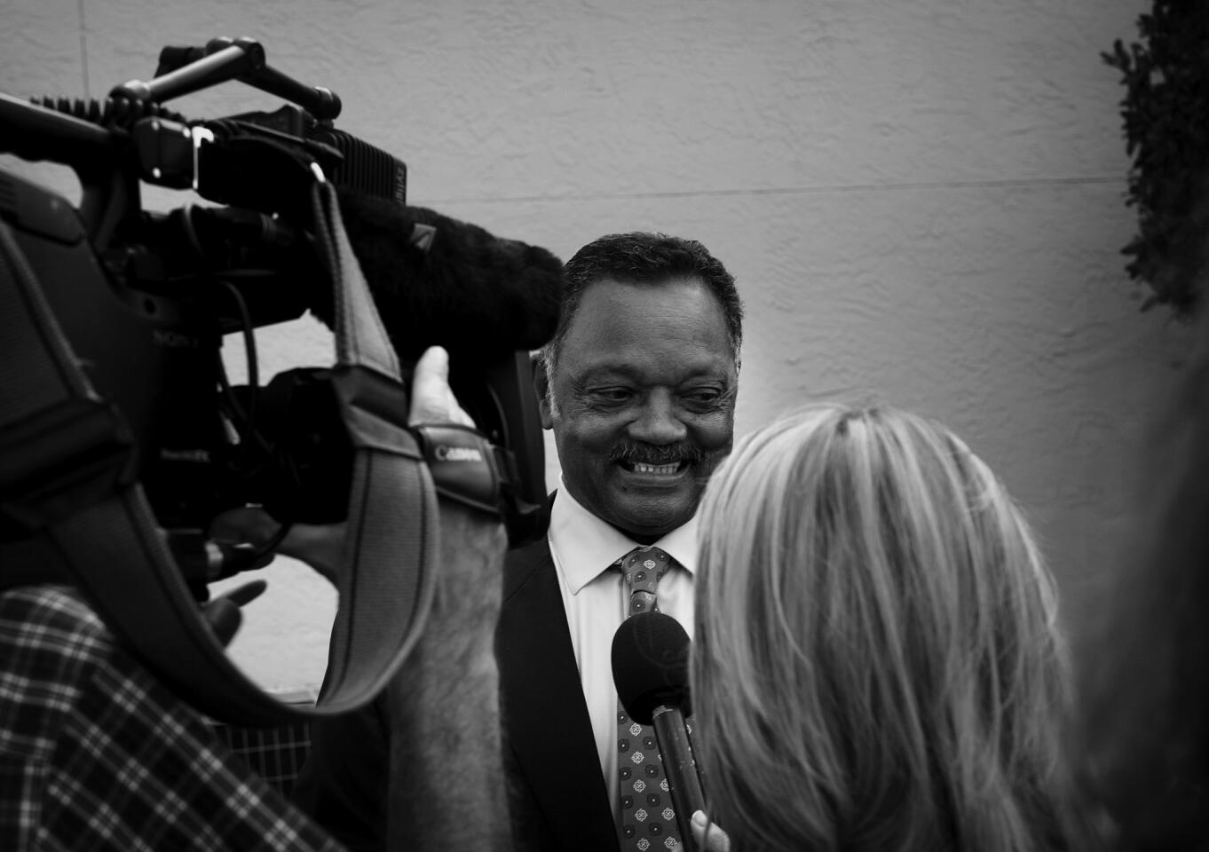 Jesse Jackson speaks to reporters outside of Macedonia Missionary Baptist Church in Eatonville on March 25, 2012. Jackson spoke to the congregation about Trayvon Martin and other topics during his hour long sermon.