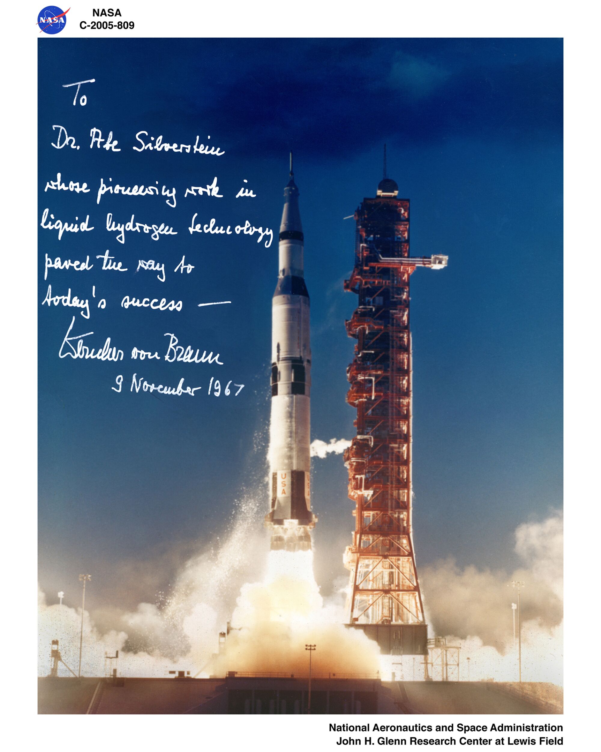 Signed photographic print of a Saturn 5 launch