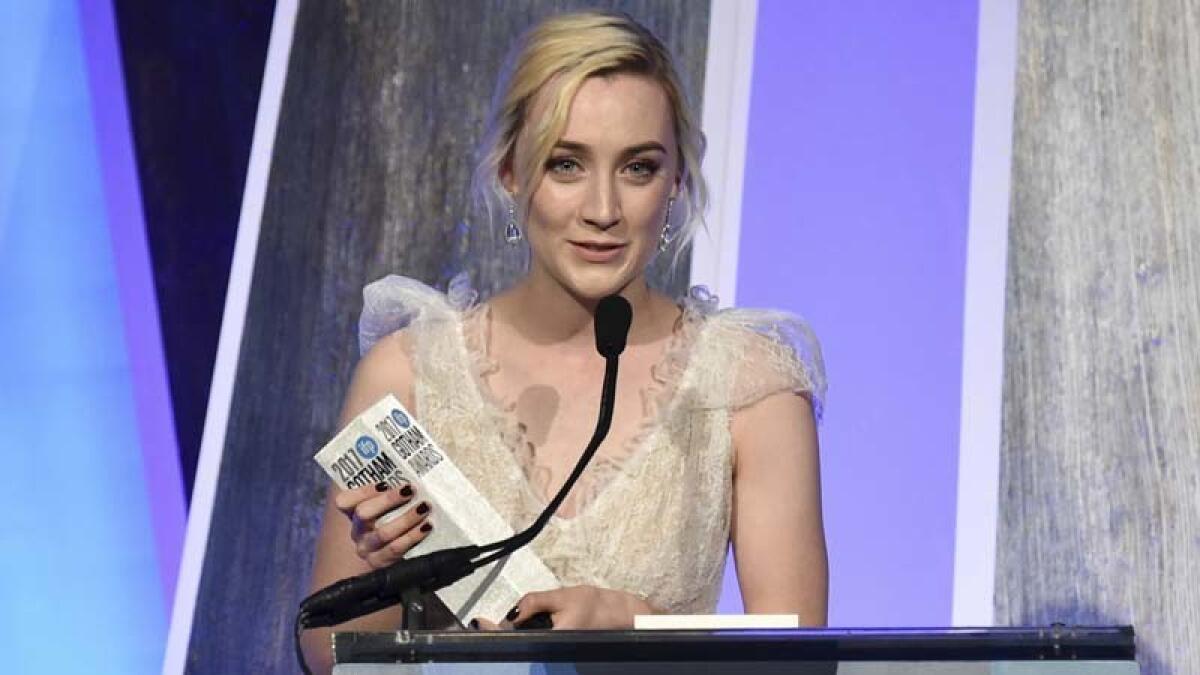 “Lady Bird” star Saoirse Ronan accepts the Gotham Awards' best actress trophy.