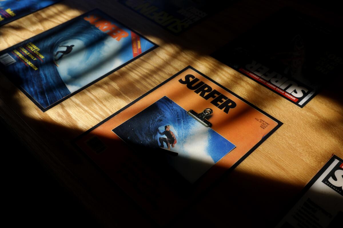 Surfer magazines decorate the tables at Beach Break Cafe in Oceanside on Oct. 31, 2019.
