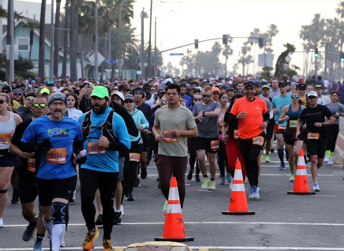 About 15,000 runners took part in the Surf City Marathon, which also included a half marathon and a 5K race.