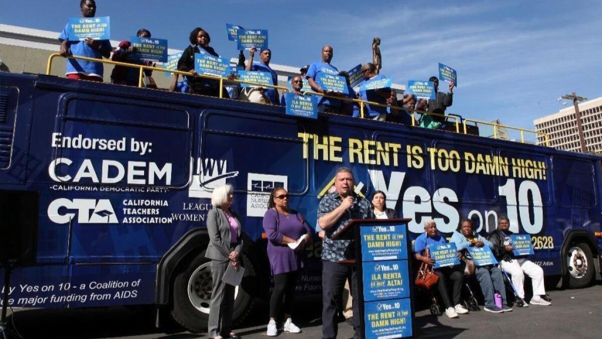 Supporters of Proposition 10 and rent control hold a news conference in Sacramento on Oct. 24.