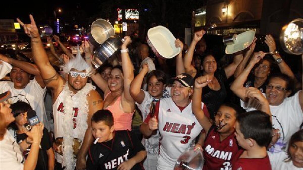 Fake SportsCenter on X: Miami Heat Fan's Breast Almost Fall Out