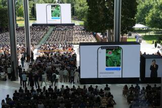 Attendees during the Apple Worldwide Developers Conference (WWDC) at Apple Park campus in Cupertino, California, US, on Monday, June 8, 2026. Apple Inc. will unveil a new artificial intelligence strategy on Monday at its annual Worldwide Developers Conference, aiming for redemption two years after its first AI rollout was plagued by subpar technology and delayed features. Photographer: Bloomberg/Bloomberg