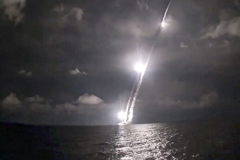 In this photo taken from video distributed by Russian Defense Ministry Press Service, Intercontinental ballistic missiles are launched by the Vladimir Monomakh nuclear submarine of the Russian navy from the Sera of Okhotsk, Russia, Saturday, Dec. 12, 2020. The submarine successfully test-fired four intercontinental ballistic missiles in a show of readiness of the nation's nuclear deterrent. (Russian Defense Ministry Press Service via AP)