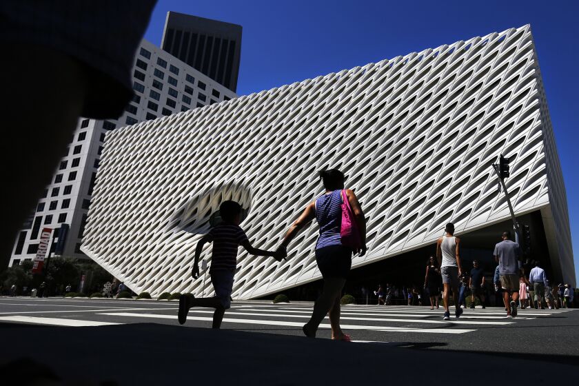 Throngs of people waited in warm temperatures for a look inside the Broad art museum on Sunday in downtown Los Angeles.
