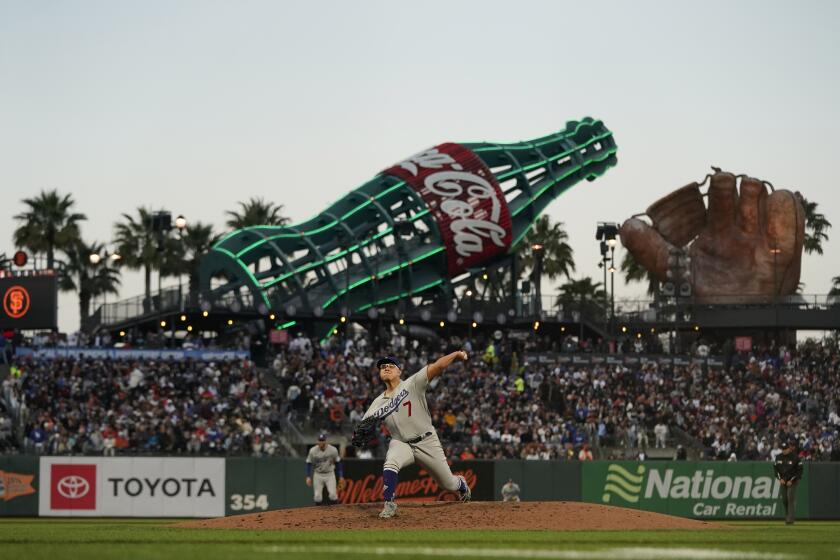 Los Angeles Dodgers' Julio Urias pitches against the San Francisco Giants during a baseball game in San Francisco, Tuesday, July 27, 2021. (AP Photo/Jeff Chiu)