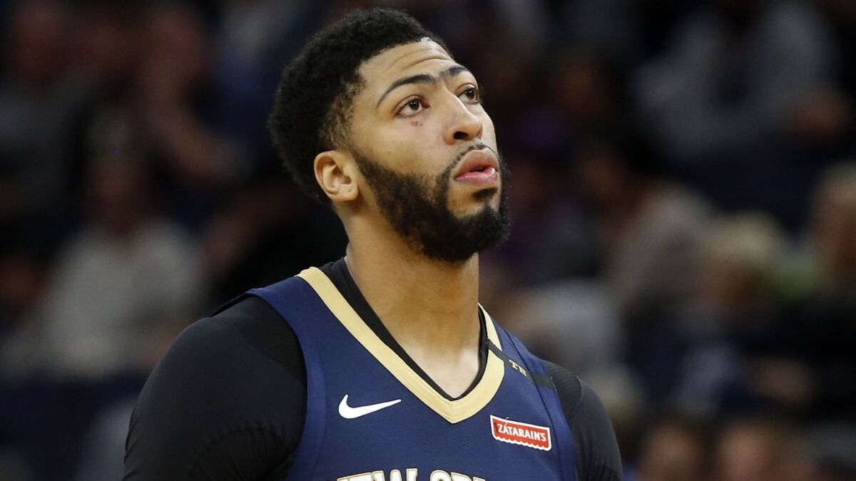 Anthony Davis' agent says the five-time All-Star has told the New Orleans Pelicans he wants to be traded to a contending team.