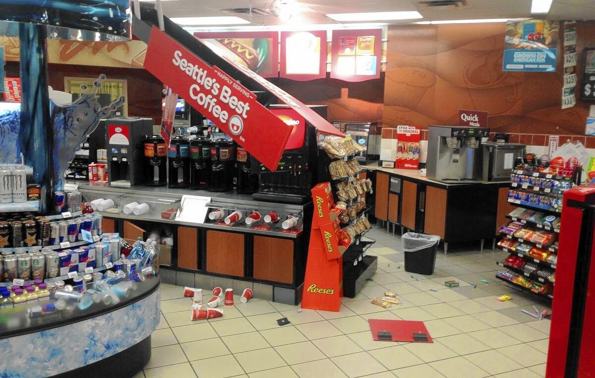 A Chevron station in La Habra is a bit of a mess after Friday's swarm of quakes.