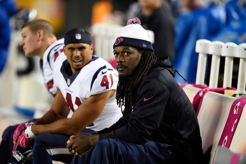 Jadeveon Clowney sits on the bench during the Texans' "Monday Night Football" game against the Steelers on Oct. 20.