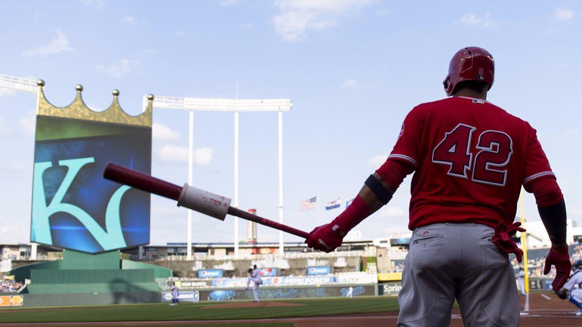 Angels' Yunel Escobar warms up before taking his at-bat in the first inning against the Kansas City Royals on April 15.