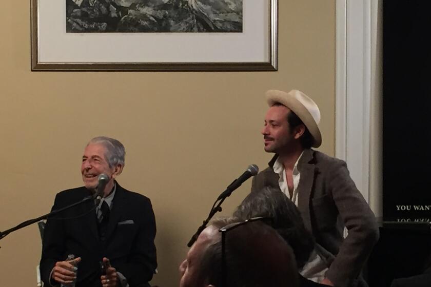 Veteran singer-songwriter Leonard Cohen, 82, was joined by his son and producer, Adam Cohen, at a playback session in Los Angeles for the Canadian musician and poet's latest album, "You Want It Darker."