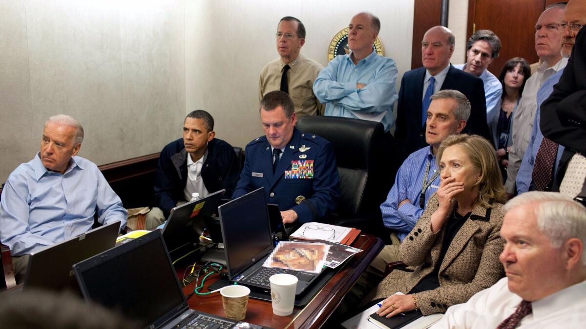 President Barack Obama and members of his national security team look on as they follow updates on the mission to kill or capture Osama bin Laden in Pakistan from the Situation Room of the White House on May 1, 2011.