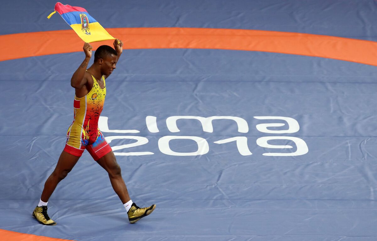 LIMA, PERU - AUGUST 07: Andres Montano of Ecuador celebrates after winning his fight against Dichter Toro of Colombia during the Wrestling Men's Greco-Roman 60 kg Finals at Miguel Grau Coliseum on Day 12 of Lima 2019 Pan American Games on August 07, 2019 in Lima, Peru. (Photo by Leonardo Fernandez/Getty Images) ** OUTS - ELSENT, FPG, CM - OUTS * NM, PH, VA if sourced by CT, LA or MoD **