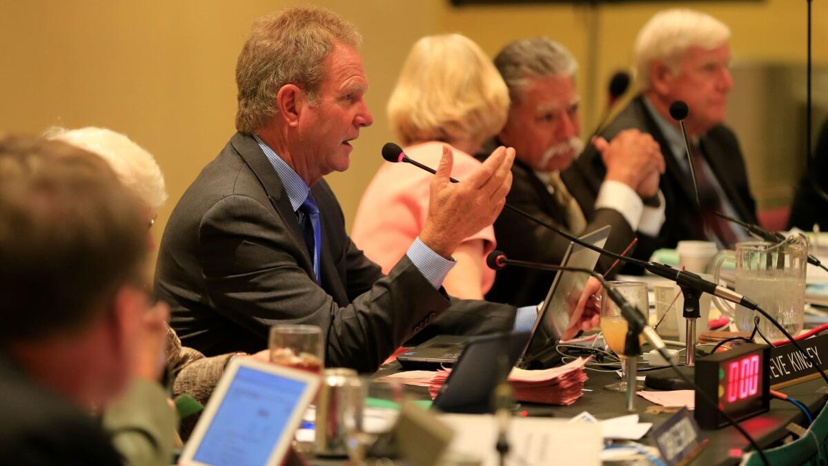 Members of the California Coastal Commission, including former Chairman Steve Kinsey, who stepped down at the beginning of the year, discuss a proposal in 2015.