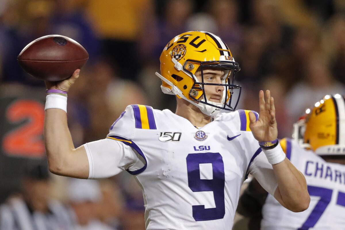 LSU quarterback Joe Burrow passes in the first half against Florida in Baton Rouge, La. on Saturday.