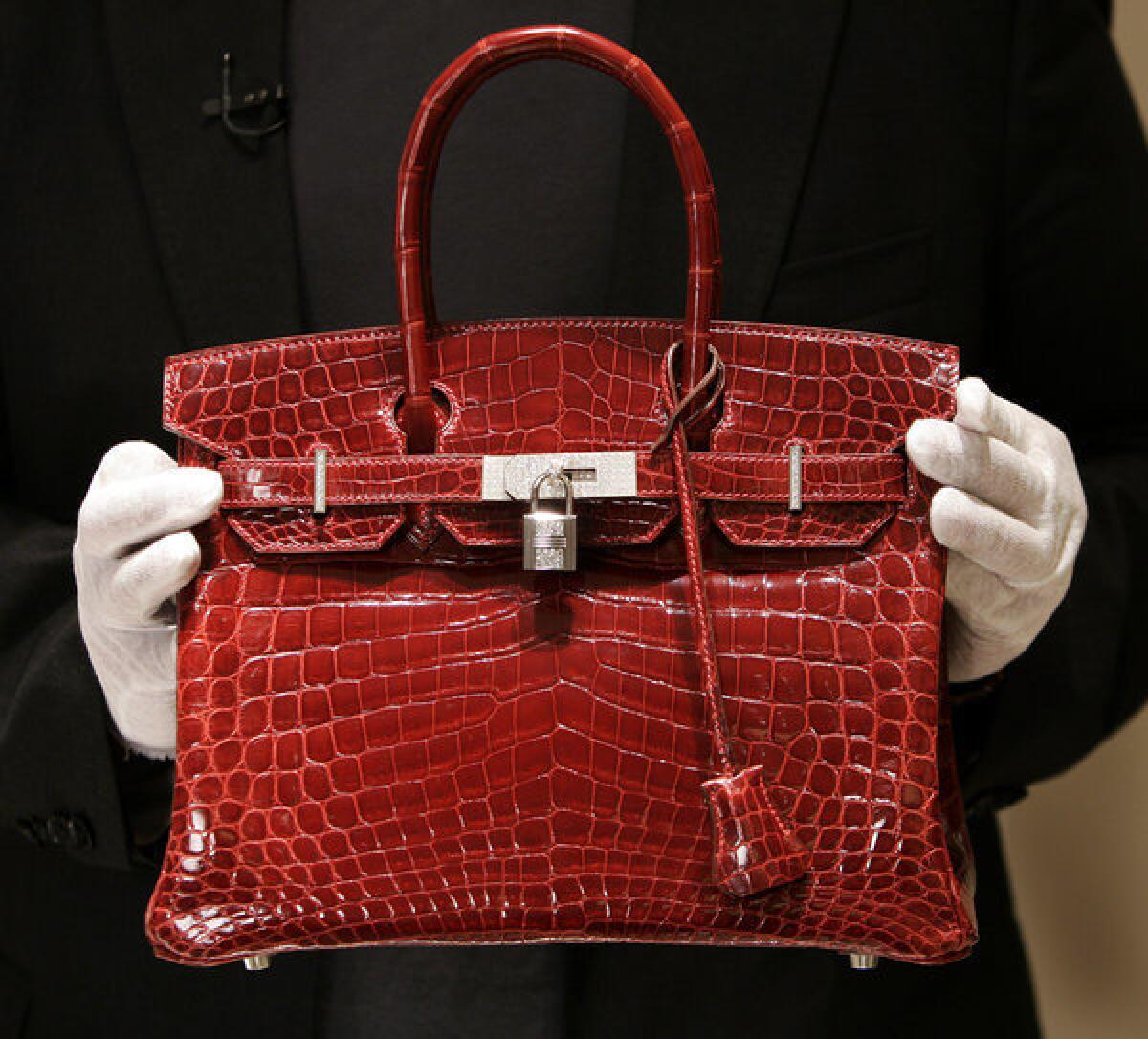 Wealthy consumers will be reining in their spending on discretionary items, such as this Hermes Birkin bag.