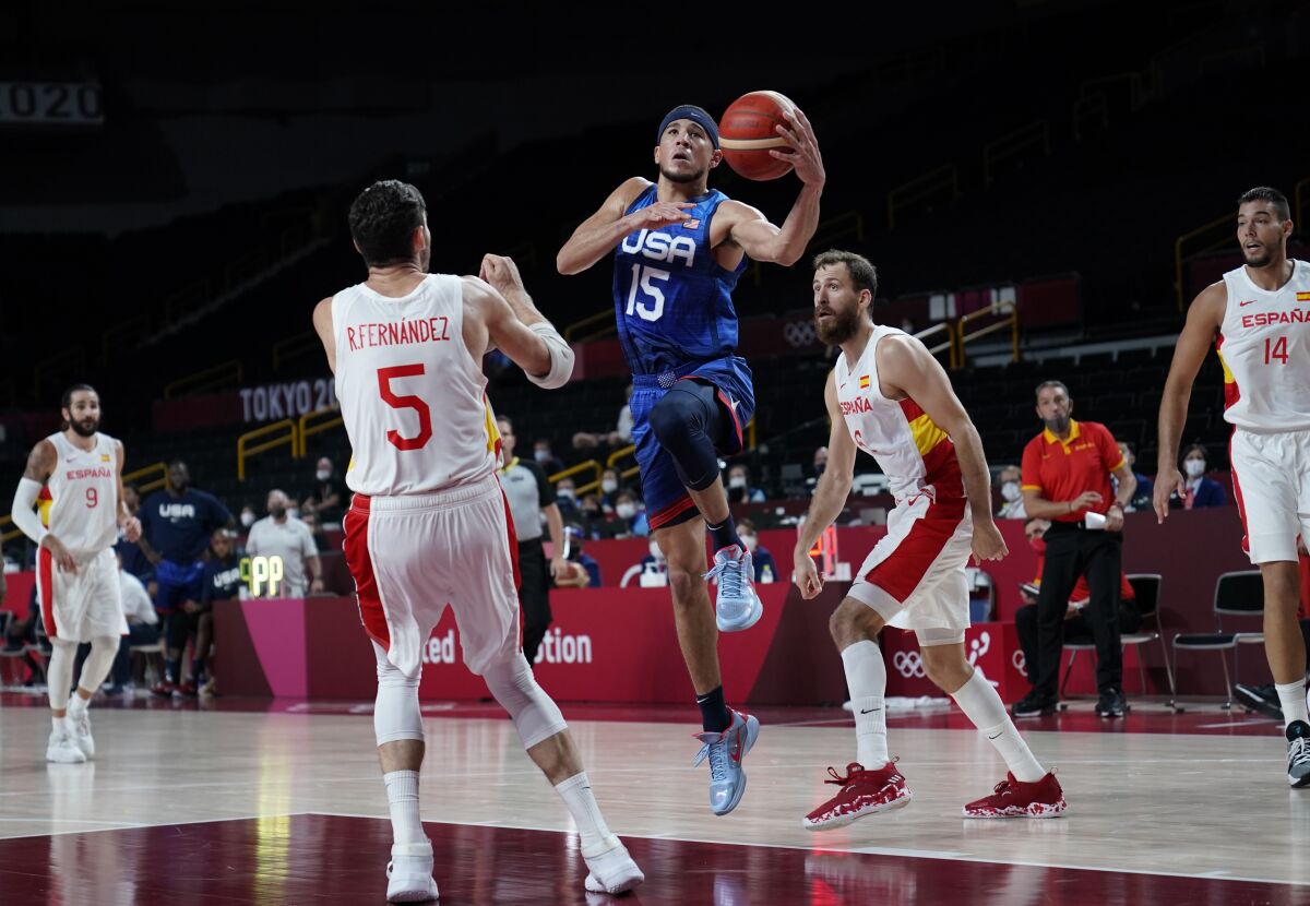 United States' Devin Booker drives to the basket.