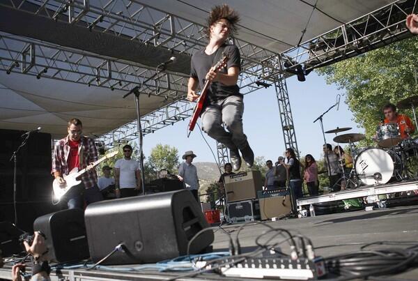 Guitarist Ken Bethea, left, vocalist and rhythm guitarist Rhett Miller and drummer Philip Peeples of Old 97's perform at the Hootenanny Festival. This year the daylong affair in Orange County offered Chuck Berry along with its usual amalgam of roots rock, punk and Americana acts. Read more in Randy Lewis' review: "Hootenanny Festival Featuring Chuck Berry."