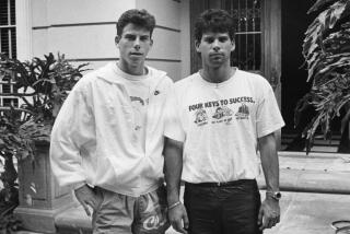 Erik Menendez, left, and is brother Lyle, in front of their Beverly Hills home. They are prime suspects in their parents murder.