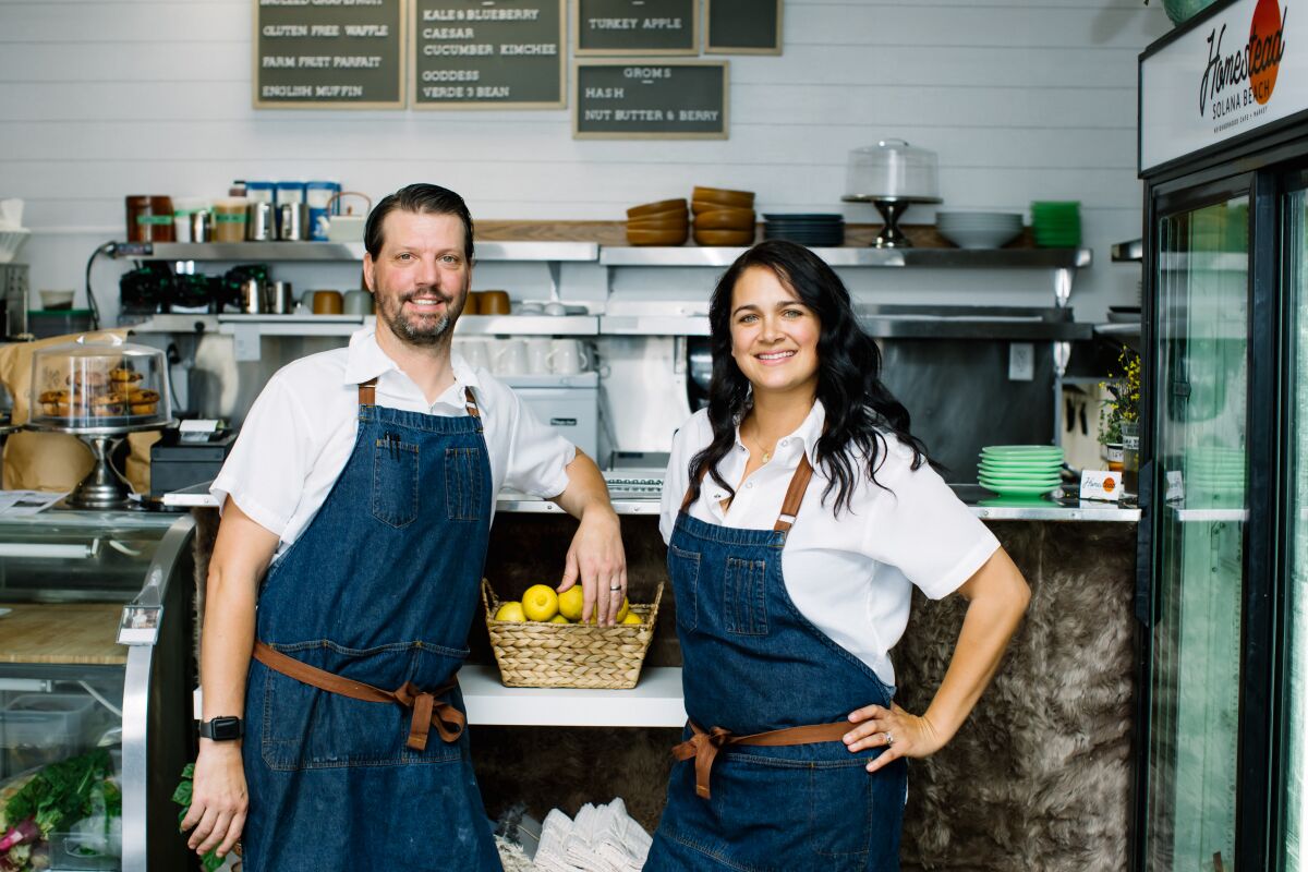 Jamie and Marie Brawn of Leucadia inside their newly opened Homestead restaurant in Solana Beach.