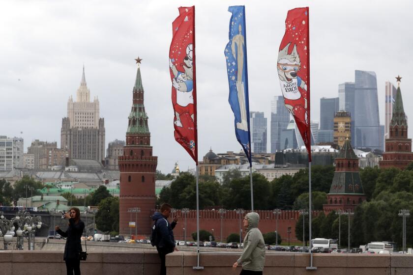 FIFA World Cup 2018 flags fly near the Kremlin in Moscow.