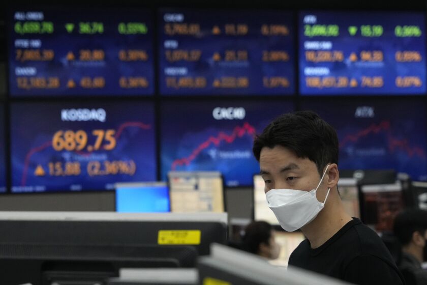 A currency trader watches monitors at the foreign exchange dealing room of the KEB Hana Bank headquarters in Seoul, South Korea, Thursday, Sept. 29, 2022. Asian stock markets have followed Wall Street higher after Britain’s central bank moved forcefully to stop a budding financial crisis. (AP Photo/Ahn Young-joon)