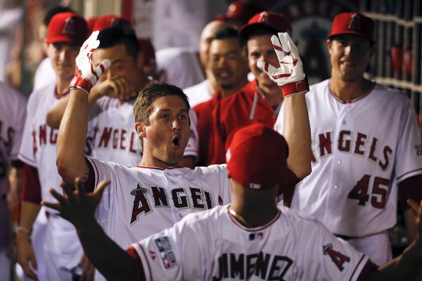 Angels' David Freese celebrates his home run against the Kansas City Royals during Game 1 of an American League division series on Oct. 2.