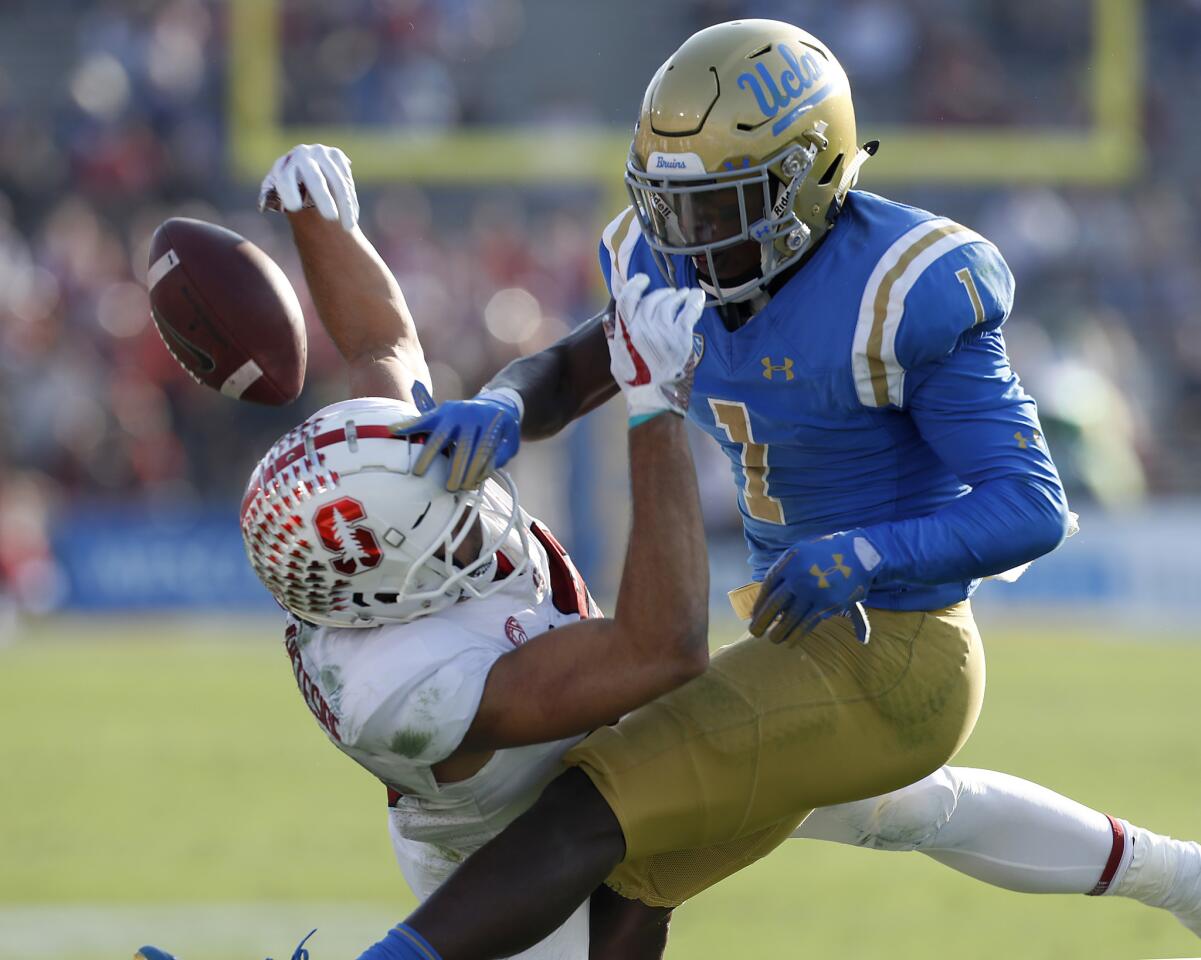 UCLA cornerback Darnay Holmes breaks up a pass intended for Stanford receiver J. Arcega-Whiteside during the third quarter.